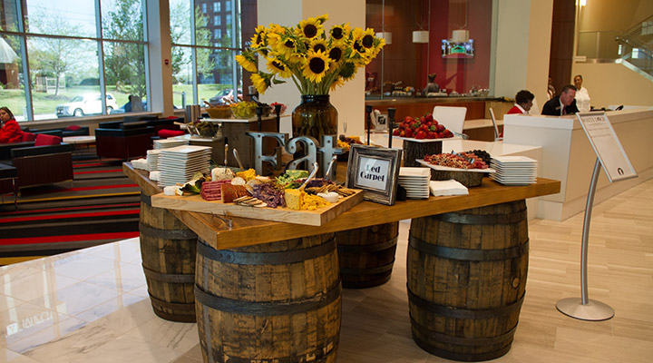 Buffet table on barrels with sunflowers