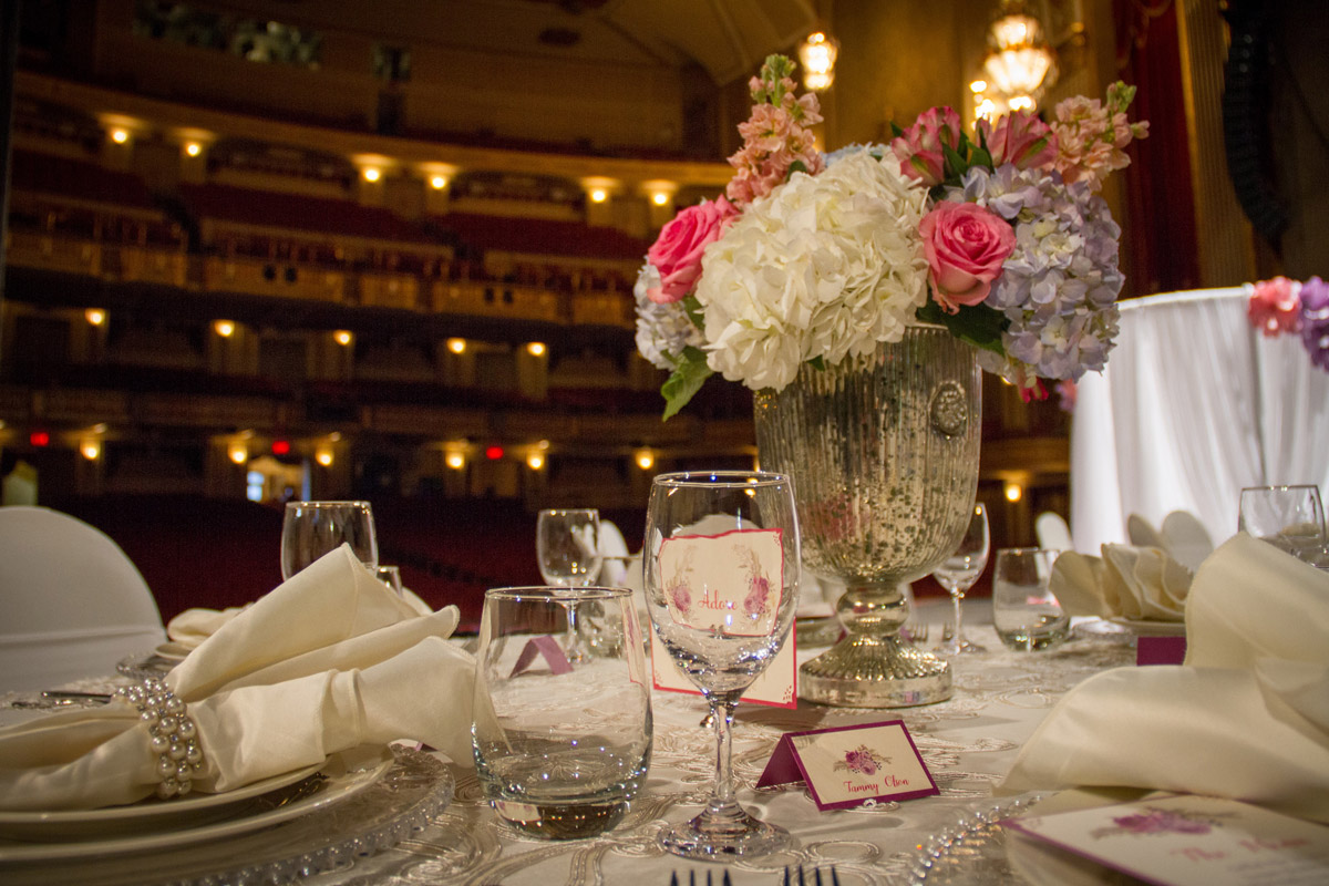 Flower centerpiece on table on stage